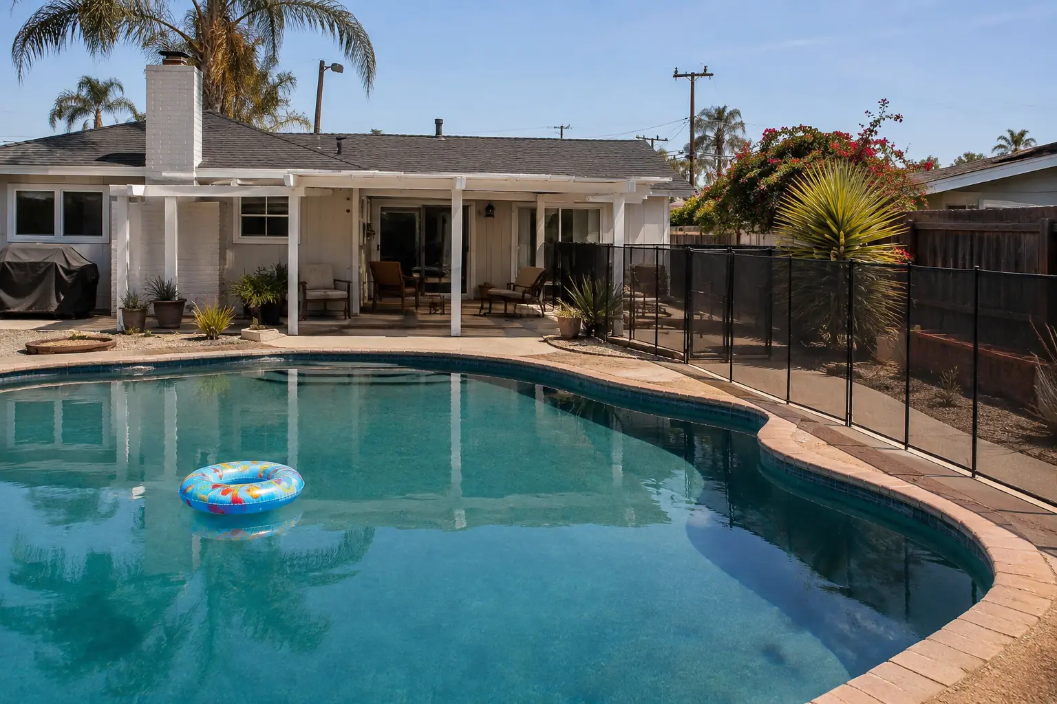 Child-safe residential pool with safety fencing in Crown Point, San Diego
